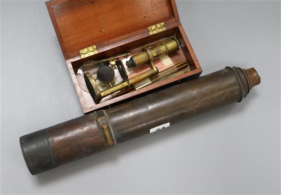 A brass microscope and a telescope
